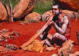 man playing didgeridoo